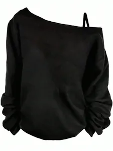 Detailed view of a minimalist black long-sleeved top featuring an off-the-shoulder cut.