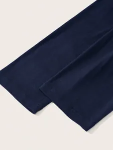 Close-up of navy blue long sleeve cuffs showing professional double-needle hem stitching
