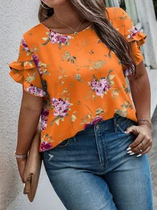 Detailed view of women's orange floral print blouse with ruffled sleeves and crew neck