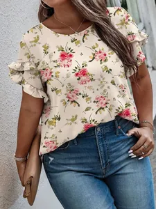 Detail of floral print plus size blouse with ruffled sleeves and feminine round neckline
