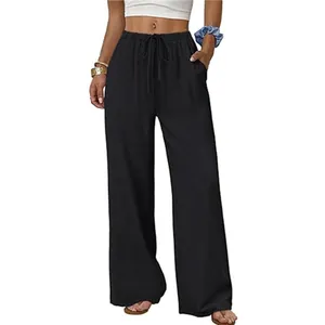 Close-up detail view of women's casual wide-leg trousers with drawstring elastic waist