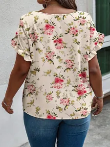 Back view of a plus size floral print top with feminine ruffle sleeves for summer.