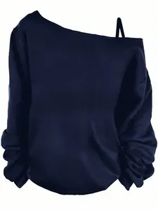 Elegant navy blue off-the-shoulder long-sleeve top featuring a thin shoulder strap detail