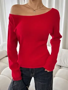 Detail view of vibrant red off-shoulder ribbed knit top with a slim fit Y2K style