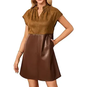 Chic faux suede and PU leather patchwork V-neck cap sleeve mini dress with pockets.