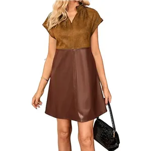 Detail of v-neck color-block mini dress featuring faux suede and PU leather patchwork