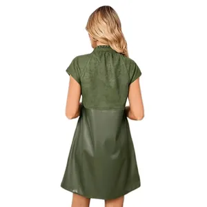 Detailed back view of olive green faux suede and PU leather patchwork mini dress