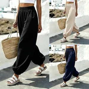 Women's high-waisted lantern pants in black, beige and navy for beach vacation style
