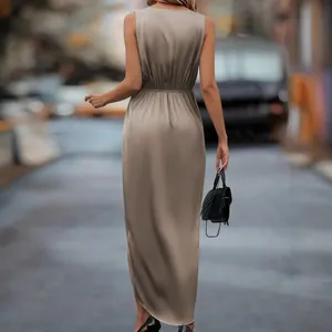 Elegant khaki satin sleeveless maxi dress with back slit and pleated waist detail.