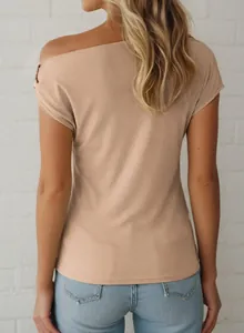 Back view showing texture of beige ribbed off-shoulder top with metallic shoulder button