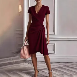Elegant burgundy V-neck ruched bodycon dress with wrap design and short sleeves