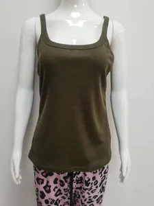Detail showing olive green ribbed texture and classic scoop neck on slim tank top