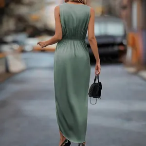 Rear view of elegant sage green satin sleeveless long dress with irregular hem