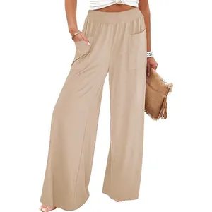 Comfortable high-waisted wide-leg pants with side pockets in beige color