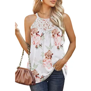 Close-up detail of a white sleeveless top with lace neckline and pink floral print