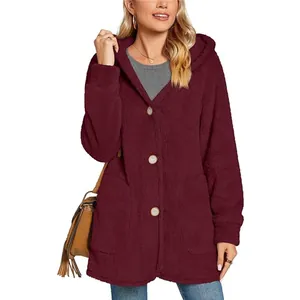 Close-up detail of women's burgundy fuzzy hooded cardigan jacket with buttons and large pockets