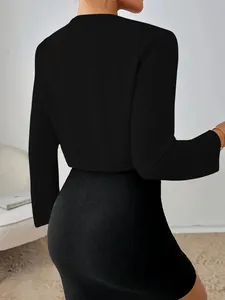 Back view of a chic black cropped long-sleeve slim fit blazer for stylish women.