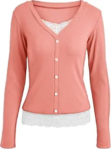 Detail view of pink ribbed V-neck top with delicate white lace patchwork hem