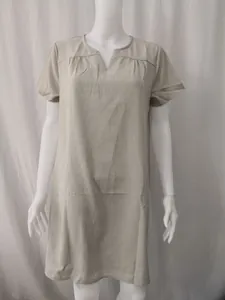 Minimalist loose casual cotton linen short sleeve dress with V-neck detail shown on mannequin