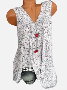 Mouwloze V-hals blouse detail met bloemenprint, witte stof met roze bloemen erop