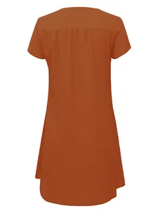Detailed back view of a short-sleeve solid color burnt orange woven loose summer dress.