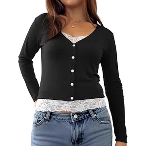Elegant black long sleeve V-neck ribbed top featuring white lace trim fake two-piece style