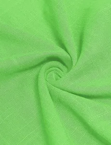High-quality close-up detail of bright green woven fabric texture for summer dress