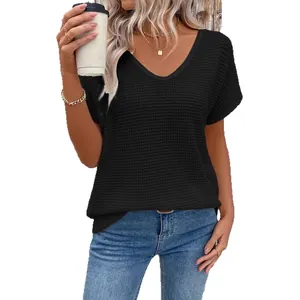 Casual women's black V-neck waffle knit short sleeve t-shirt top shown on model