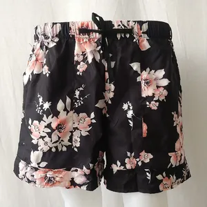 Women's floral print high-waisted shorts with black elastic drawstring waistband
