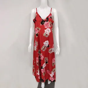 Elegant red summer slip dress featuring bold rose floral prints and a deep v-neckline