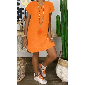 Women's summer loose V-neck short sleeve orange woven dress with colorful accessories