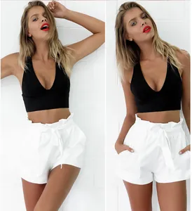 High waisted white casual shorts with elastic bow belt, split view showing fit and style.