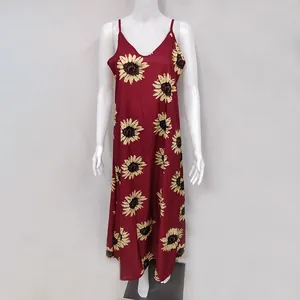 Detailed view of women's burgundy sunflower print maxi sundress with flowy V-neck straps