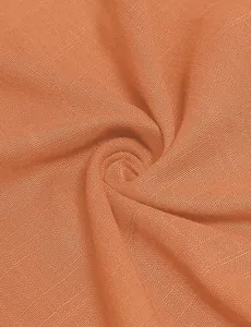 Close-up macro view showing the fine breathable woven fabric texture in terracotta orange
