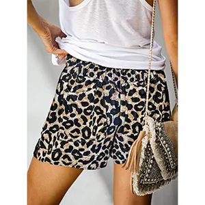 Close-up of women's leopard print high-waist casual shorts with elastic waistband.