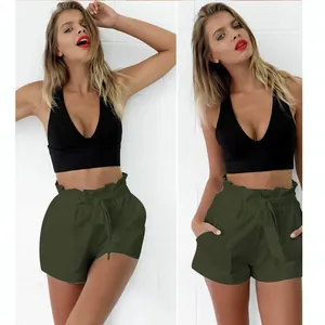Casual high-waisted olive green wide-leg shorts with black V-neck crop top outfit