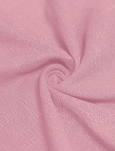 Close-up macro shot of soft pink woven fabric texture for a lightweight summer dress