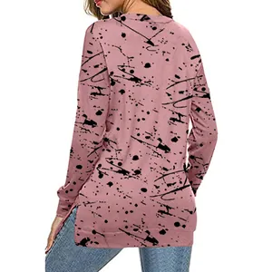 Back view of pink loose long sleeve t-shirt with black graffiti ink splash print
