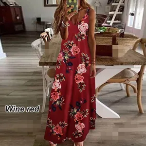 Detail view of wine red floral print maxi dress featuring elegant suspender straps.
