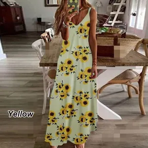 Full-length view of a yellow sunflower print spaghetti strap maxi dress for summer