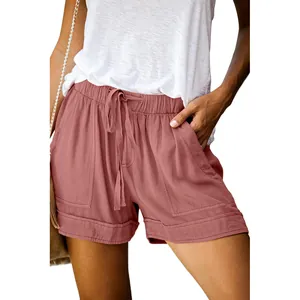 Close-up of women's casual pink drawstring shorts with high elastic waist and pockets