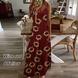 Detailed view of bohemian wine red maxi dress featuring vibrant yellow sunflower prints