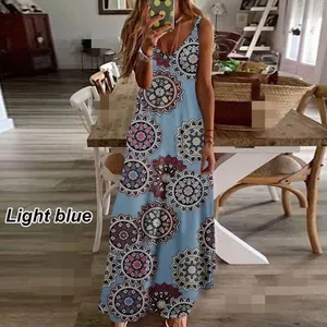 Elegant light blue maxi dress featuring a vibrant floral mandala print and deep V-neckline