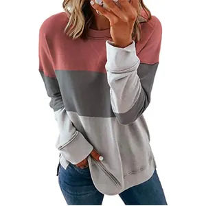 Close-up of the three-color stripe design and relaxed fit on a casual long-sleeved shirt