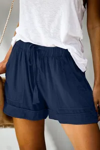 Close-up of navy blue high-waist drawstring shorts with pockets for women