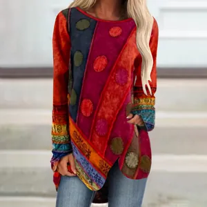 Close-up of retro irregular hem T-shirt with vibrant polka dot and stripe prints.