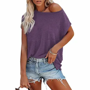 Close-up of a purple batwing sleeve off-shoulder top with a chest pocket and soft texture