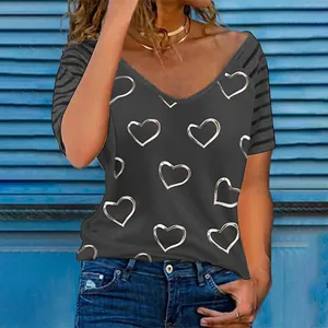 Close-up of women's grey V-neck T-shirt with heart print and striped sleeves