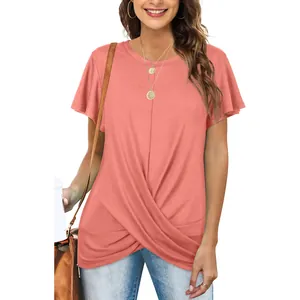 Detailed view of the stylish front twist knot on a women's coral short sleeve T-shirt