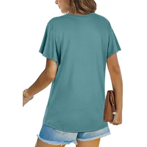 Back view of a premium teal round neck solid color short sleeve T-shirt for women's casual wear